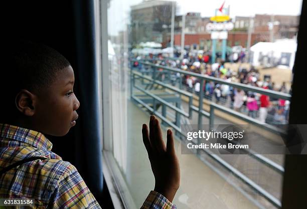 Ja'Marieon Anderson looks out a window in the National Civil Rights Museum near the spot where Martin Luther King Jr. Was struck down by a bullett on...