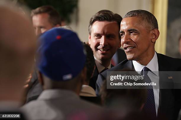 President Barack Obama and his Press Secretary Josh Earnest celebrate the Major League Baseball World Series champions Chicago Cubs in the East Room...