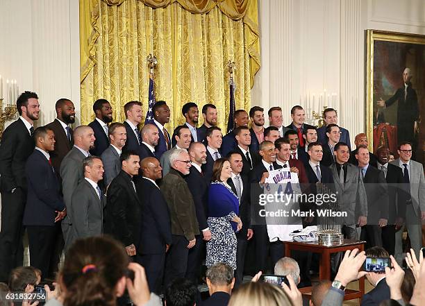 President Barack Obama poses for a picture with members of the 2016 World Series Champion Chicago Cubs in The East Room at the White House, on...