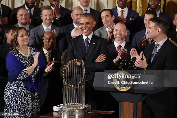 President Barack Obama smiles after being granted a 'midnight pardon' to become a fan of the Major League Baseball World Series champion Chicago Cubs...