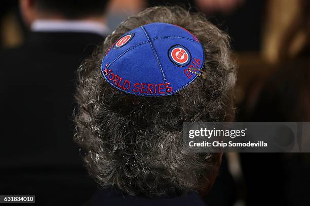 White House guest wears a yarmulke decorated with the Major League Baseball World Series champion Chicago Cubs during a celebration for the team in...