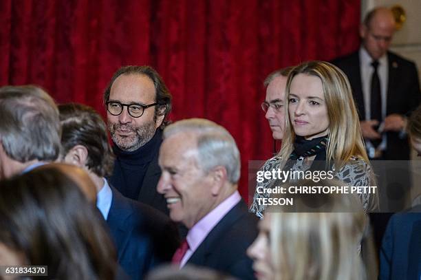 French communication group Iliad CEO Xavier Niel and his partner French Director and Executive Vice President of Louis Vuitton Delphine Arnault...