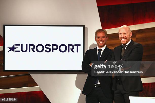 Matthias Sammer poses with Jan Henkel during a photocall at Eurosport studios on January 16, 2017 in Munich, Germany.
