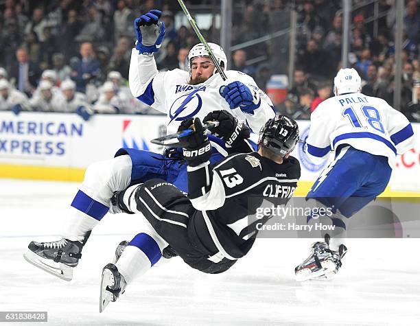 Luke Witkowski of the Tampa Bay Lightning checks Kyle Clifford of the Los Angeles Kings during the first period at Staples Center on January 16, 2017...