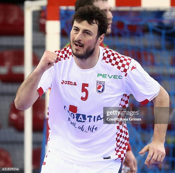 Domagoj Dunjak of Croatia celebrates a goal during the 25th IHF Men's World Championship 2017 match between Croatia and Belarus at Kindarena on...