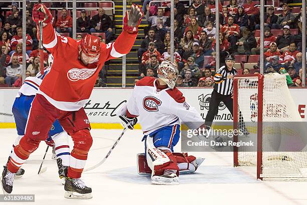 Thomas Vanek of the Detroit Red Wings celebrates a second period goal on Carey Price of the Montreal Canadiens during an NHL game at Joe Louis Arena...