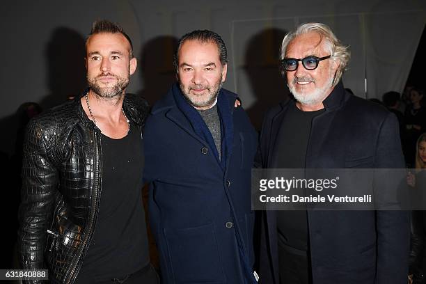 Philipp Plein, Remo Ruffini and Flavio Briatore attend the Billionaire show during Milan Men's Fashion Week Fall/Winter 2017/18 on January 16, 2017...