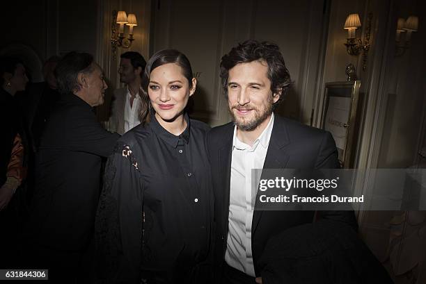 Marion Cotillard and Guillaume Canet attend the Cesar Revelations 2017' dinner at the Salon Chaumet on January 16, 2017 in Paris, France.