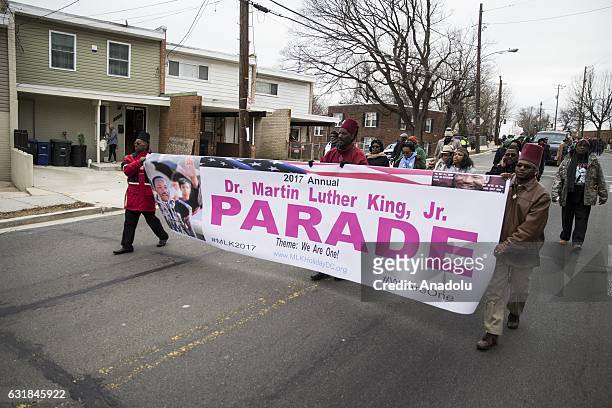 January 16: People march in the Martin Luther King Day Parade in memory of the Civil Rights leaders birthday in Washington, USA on January 16, 2017....