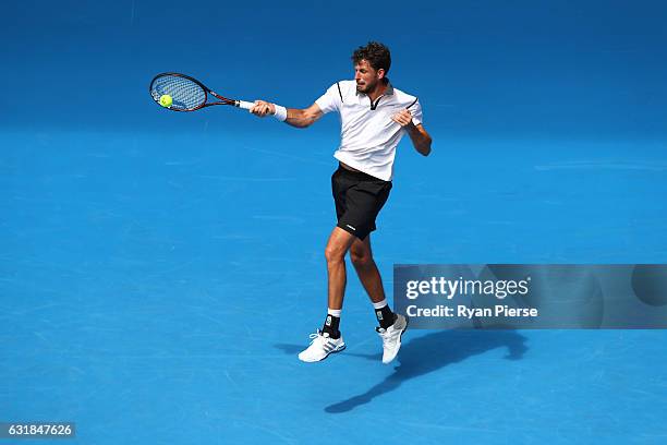 Robin Haase of the Netherlands plays a forehand in his first round match against Alexander Zverev of Germany on day two of the 2017 Australian Open...