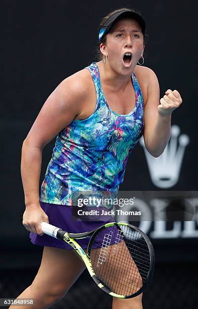 Irina Falconi of the USA celebrates her first set win during her first round match against Xinyun Han of China on day two of the 2017 Australian Open...