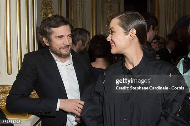 Guillaume Canet and Marion Cotillard attends the 'Cesar - Revelations 2017' on January 16, 2017 in Paris, France.