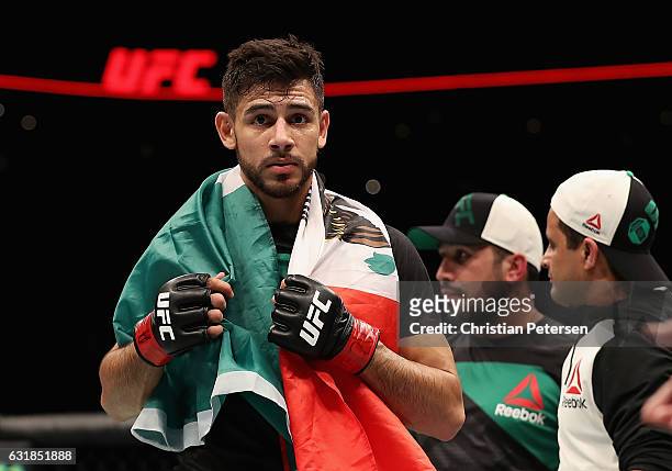 Yair Rodriguez celebrates his victory over BJ Penn during the UFC Fight Night event at the at Talking Stick Resort Arena on January 15, 2017 in...