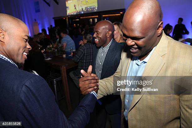 Golden State Warriors legends Corey Maggette, Tony Delk, and Adonal Foyle catch up at the first American Express "All for Dub Nation" Watch Party at...