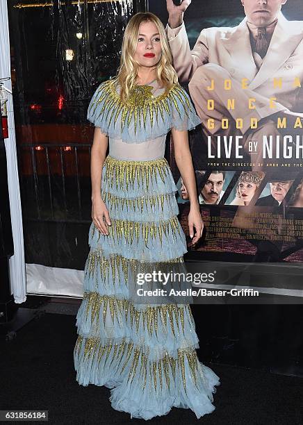 Actress Sienna Miller arrives at the Premiere of 'Live By Night' at TCL Chinese Theatre on January 9, 2017 in Hollywood, California.