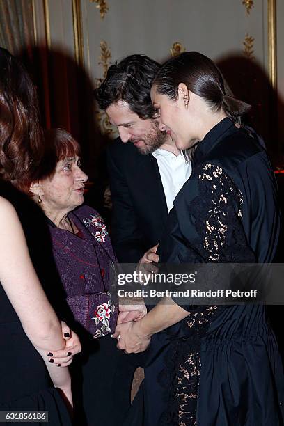 Agnes Varda, Guillaume Canet and Marion Cotillard, pregnant, attend the "Cesar - Revelations 2017" Dinner at Hotel Meurice on January 16, 2017 in...