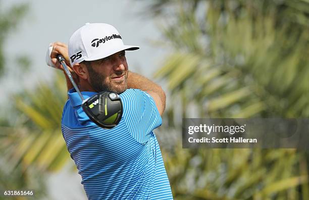 Dustin Johnson of the United States hits a shot during a practice round prior to the start of the Abu Dhabi HSBC Championship at Abu Dhabi Golf Club...