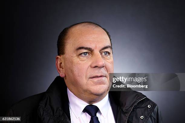 Axel Weber, chairman of UBS Group AG, poses for a photograph following a Bloomberg Television interview during the World Economic Forum in Davos,...