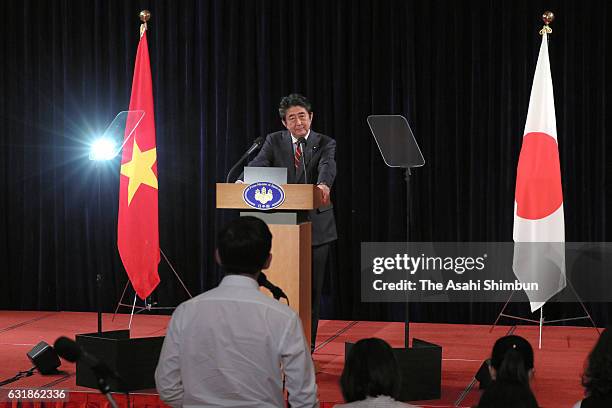 Japanese Prime Minister Shinzo Abe attends a press conference on January 16, 2017 in Hanoi, Vietnam. Abe is on 6-day tour to the Philippines,...