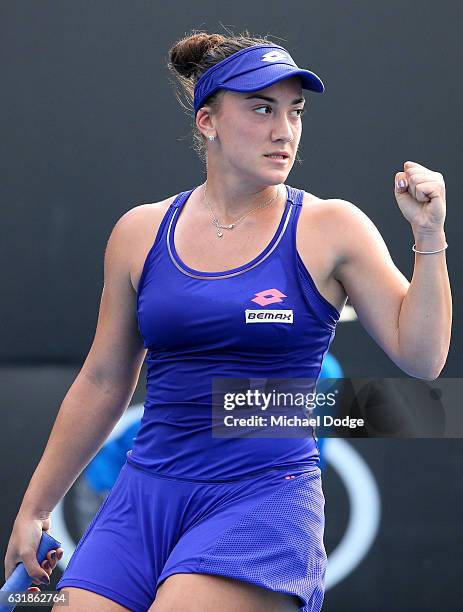 Danka Kovinic of Montenegro celebrates in her first round match against Saisai Zheng of China on day two of the 2017 Australian Open at Melbourne...