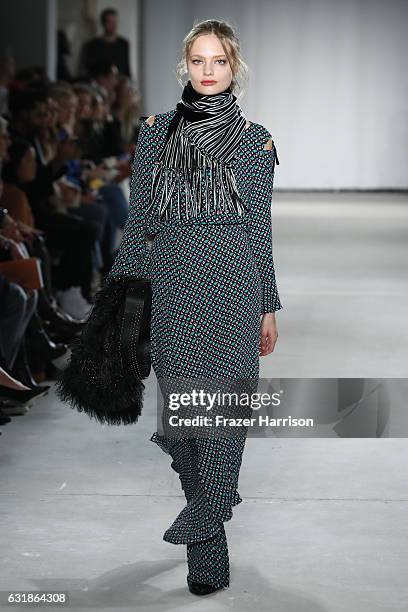Model walks the runway at the Dorothee Schumacher show during the Mercedes-Benz Fashion Week Berlin A/W 2017 at Kaufhaus Jandorf on January 17, 2017...
