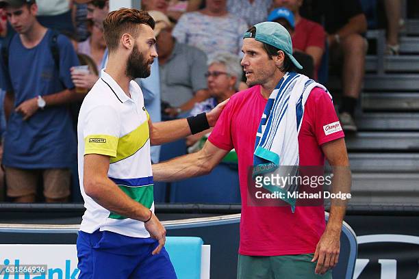 Tommy Haas of Germany retires in his first round match against Benoit Paire of France on day two of the 2017 Australian Open at Melbourne Park on...