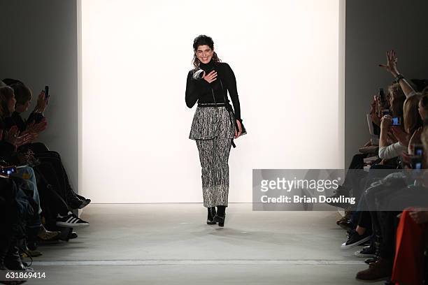Designer Dorothee Schumacher acknowledges the applause of the audience after her show during the Mercedes-Benz Fashion Week Berlin A/W 2017 at...