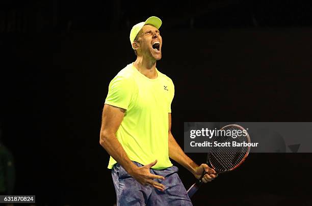 Ivo Karlovic of Croatia celebrates winning match point in his first round match against Horacio Zeballos of Argentina on day two of the 2017...