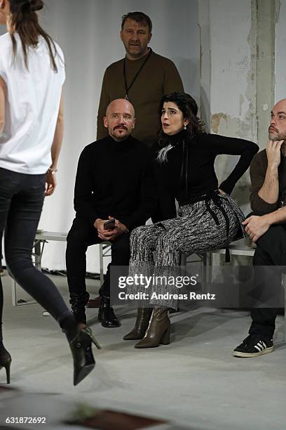 Dorothee Schumacher and members of her team watch models during the rehearsal ahead of the Dorothee Schumacher show during the Mercedes-Benz Fashion...