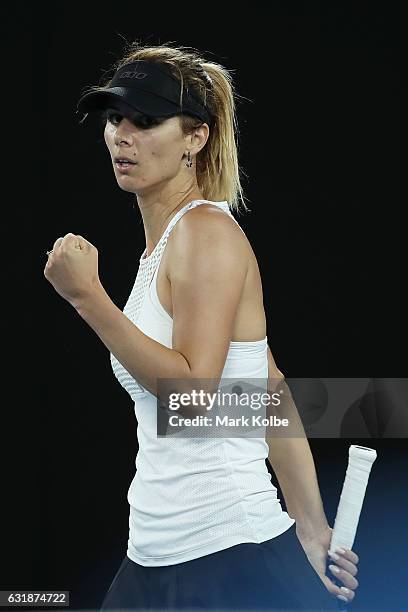 Tsvetana Pironkova of Bulgaria celebrates winning the second set in her first round match against Agnieszka Radwanska of Poland on day two of the...