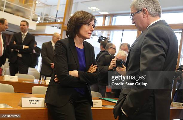 Malu Dreyer , Governor of Rhineland-Palatinate and current President of the German Federal Council , speaks with Roger Lewentz, Interior Minister of...