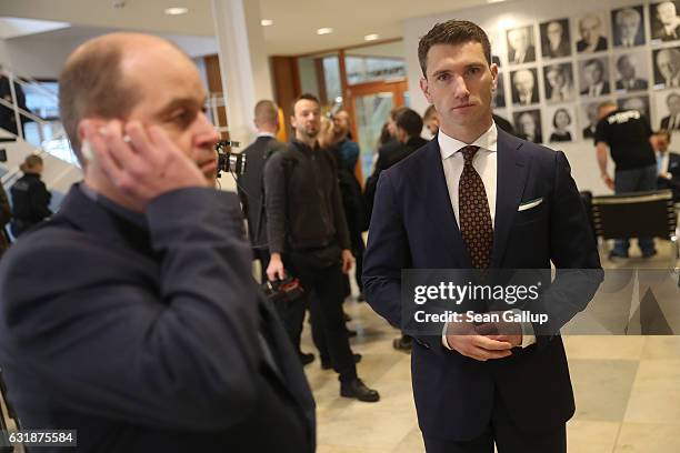 Frank Franz , Chairman of the far-right NPD political party, and NPD leading member Klaus Beier arrive for the session of the Federal Constitutional...