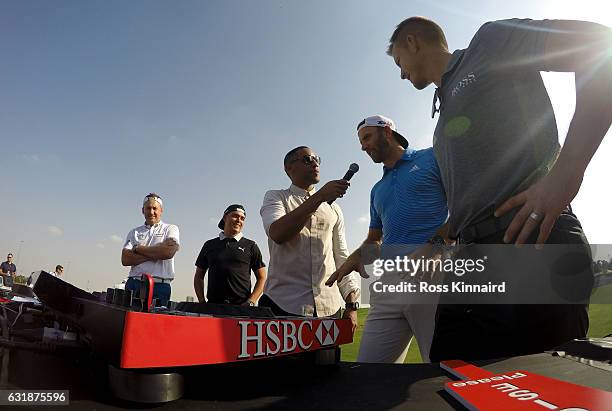 Ian Poulter of Engand, Rickie Fowler of the USA, DJ Reggie Yates, Dustin Johnson of the USA and Henrik Stenson of Sweden during a photocall on the...