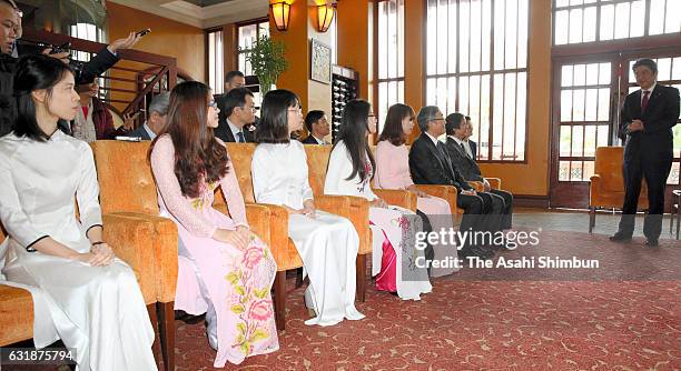 Japanese Prime Minister Shinzo Abe talks with students and staffs of the Vietnam National University on January 17, 2017 in Hanoi, Vietnam. Abe...