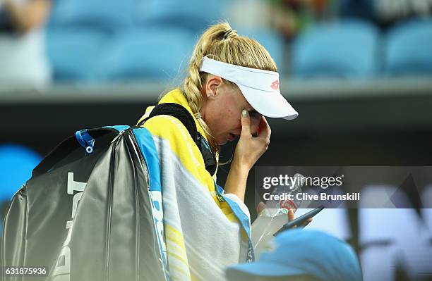 Naomi Broady of Great Britain shows her emotion as she leaves the court after her defeat in her first round match against Daria Gavrilova of...