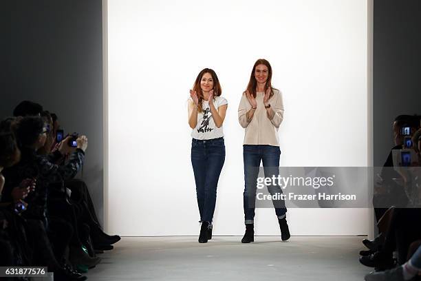 Designers Jelena Hofmann and Sedina Halilovic acknowledge the audience after their holyGhost show during the Mercedes-Benz Fashion Week Berlin A/W...