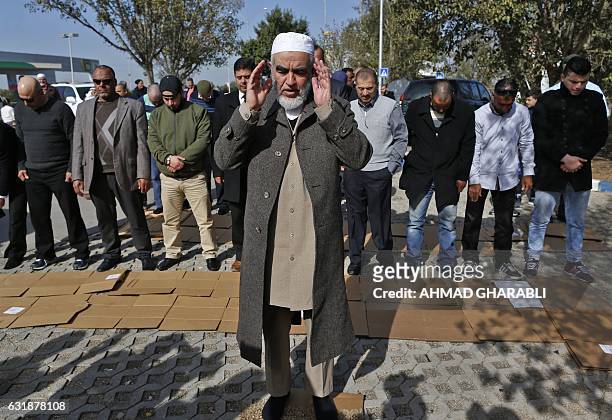 Arab-Israeli Sheikh Raed Salah the leader of the radical northern wing of the Islamic Movement in Israel, prayers with supporters in Umm al-Fahm, an...