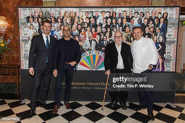 General Manager of Mandarin Oriental Hotel Group Gerard Sintes, Actor Stanley Tucci, artist Sir Peter Blake and Chef Daniel Boulud pose for a photo...