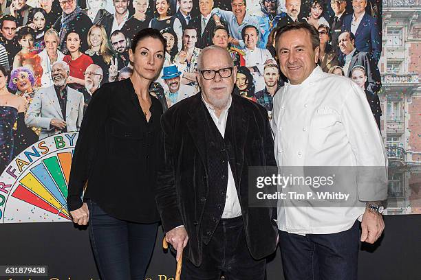 Photographer Mary McCartney, artist Sir Peter Blake and Chef Daniel Boulud pose for a photo as a new artwork "Our Fans" by Sir Peter Blake is...