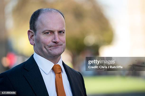 The first elected member of Parliament for UKIP, Douglas Carswell, speaks to the press on College Green outside the House of Parliament on January...
