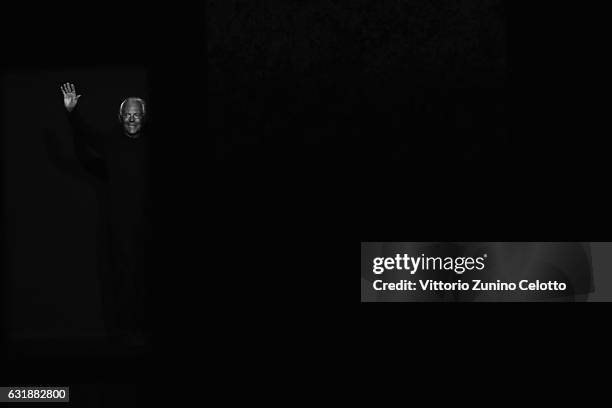 Designer Giorgio Armani acknowledges the applause of the public after the Giorgio Armani show during Milan Men's Fashion Week Fall/Winter 2017/18 on...