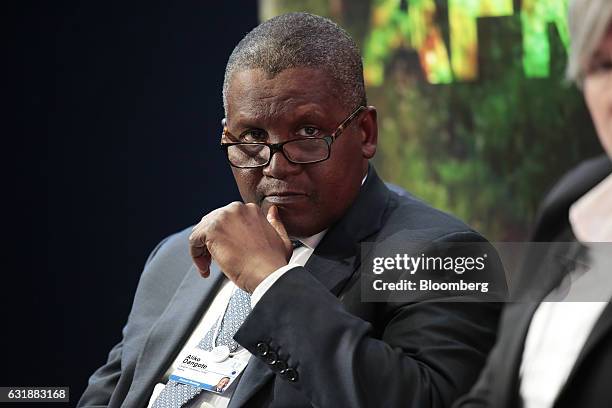 Aliko Dangote, billionaire and chief executive officer of Dangote Group, looks on during a panel session at the World Economic Forum in Davos,...