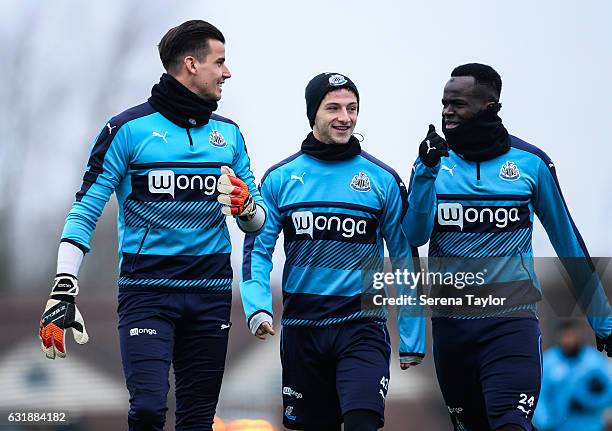 Goalkeeper Karl Darlow , Jamie Sterry and Cheick Tiote walk outside during the Newcastle United Training Session at The Newcastle United Training...