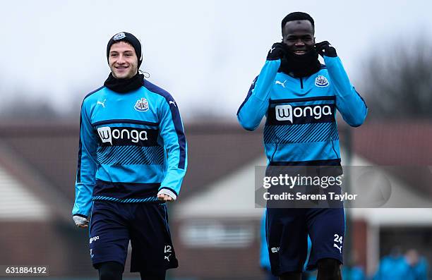 Jamie Sterry and Cheick Tiote walk outside during the Newcastle United Training Session at The Newcastle United Training Centre on January 17, 2017...