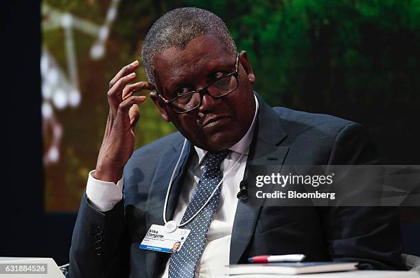 Aliko Dangote, billionaire and chief executive officer of Dangote Group, looks on during a panel session at the World Economic Forum in Davos,...