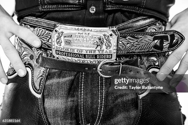 Buck Off at the Garden Preview: Closeup portrait of belt buckle of Jess Lockwood posing during photo shoot before event at Madison Square Garden....