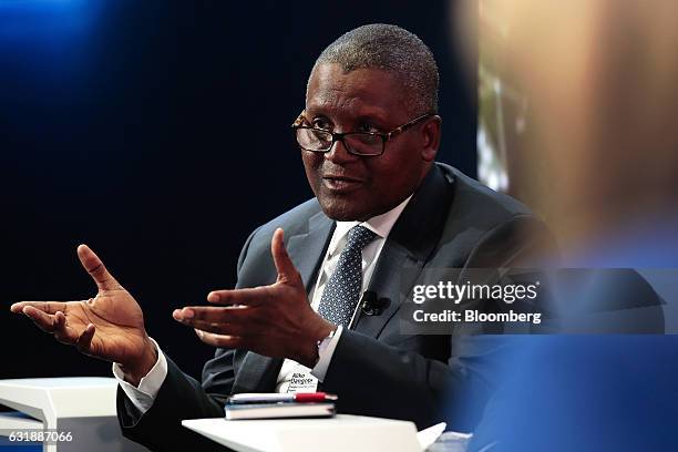 Aliko Dangote, billionaire and chief executive officer of Dangote Group, gestures as he speaks during a panel session at the World Economic Forum in...