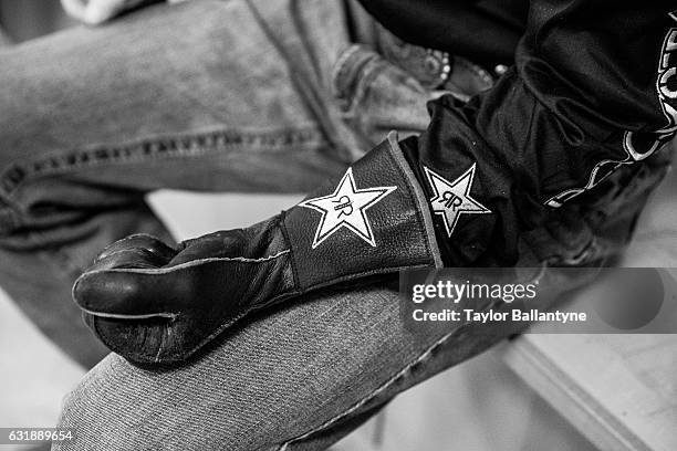 Buck Off at the Garden: Closeup portrait of glove of Fabiano Vieira backstage during photo shoot before event at Madison Square Garden. Behind the...