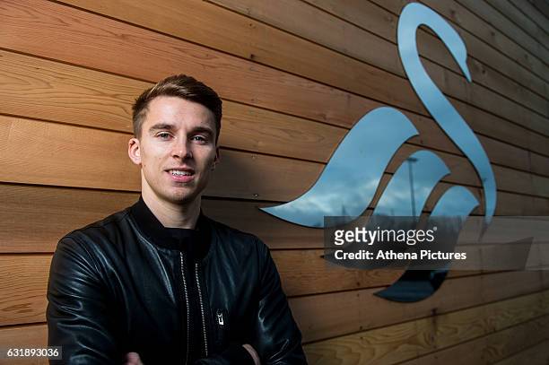 Tom Carroll smiles after signing a contract with Swansea City at The Fairwood Training Ground on January 16, 2017 in Swansea, Wales.