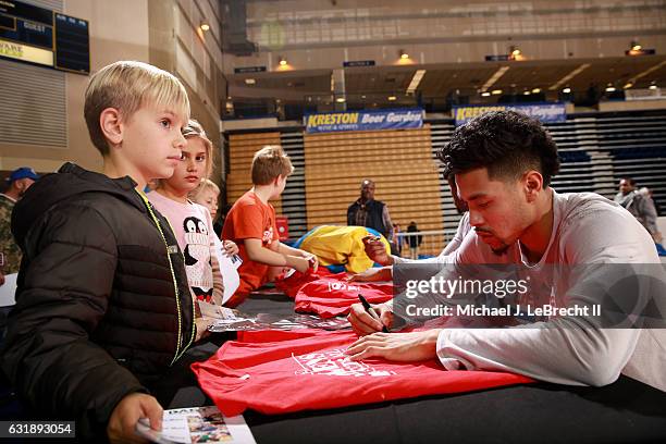 Dionte Christmas and Mikh McKinney of the Delaware 87ers sign autographs after the game against the Erie BayHawks on January 6, 2017 at the Bob...